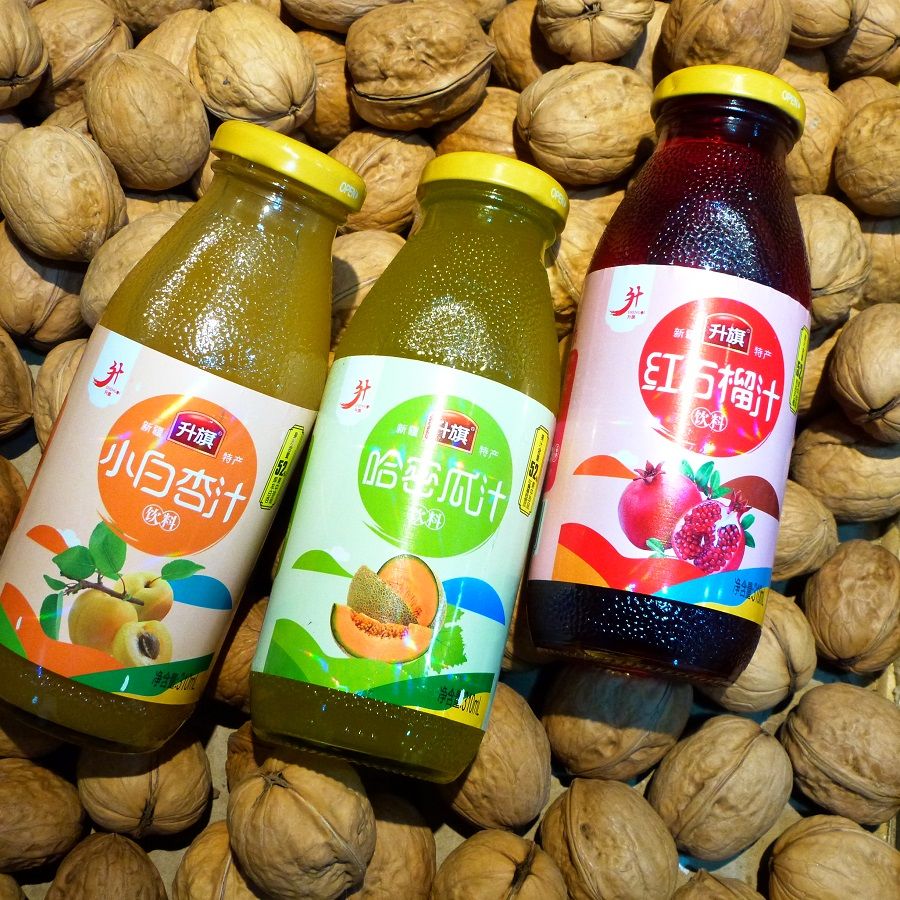 新疆特产升旗果汁饮料果汁含量50%小白杏汁石榴汁哈密瓜汁桑葚汁