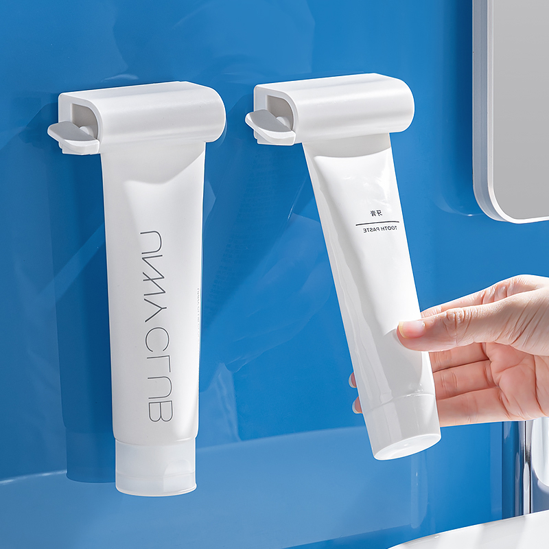 磁吸挤牙膏神器磁吸护手霜洗面奶夹子懒人置物架壁挂式手动挤压器