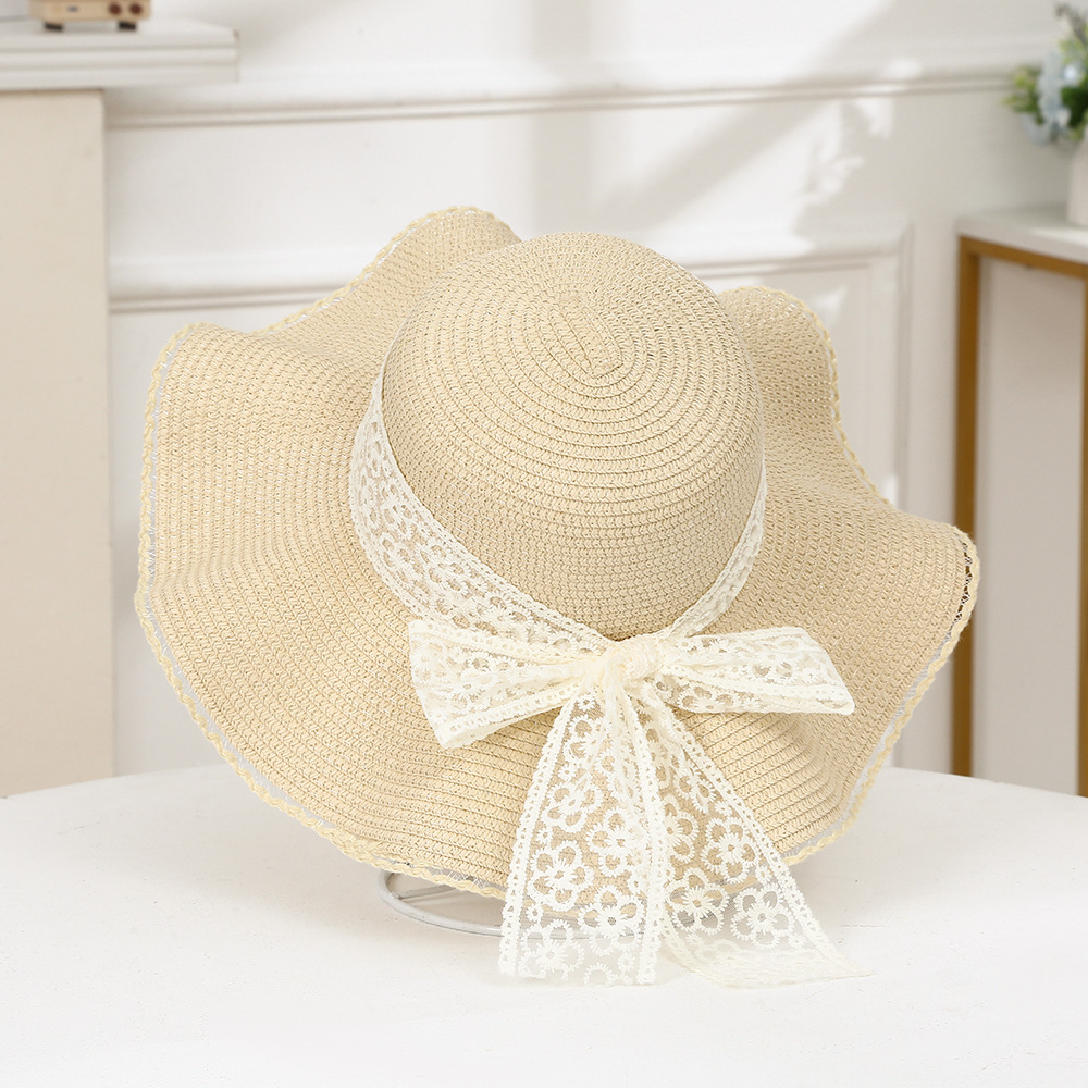 韩版女士新款夏天波浪遮阳草帽沙滩帽子蕾丝蝴蝶结太阳帽工厂现货